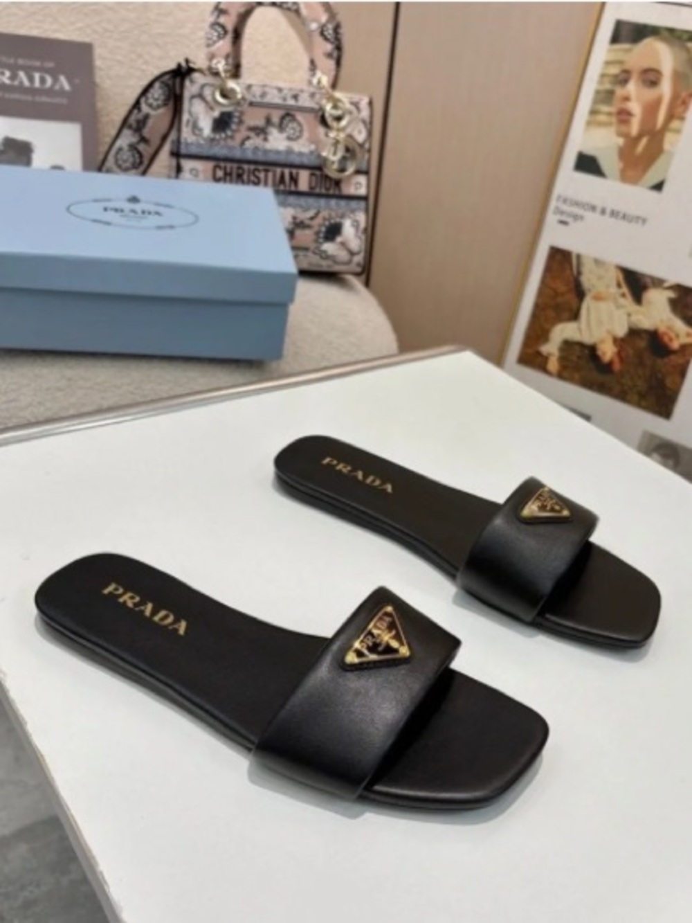 Prada Black Leather Slide Sandals with Gold Triangle Logo